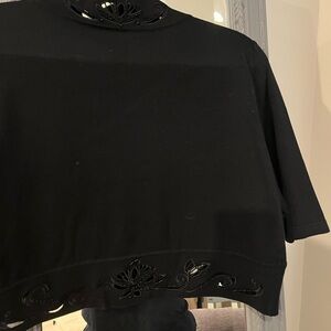 Black shrug from White House black market